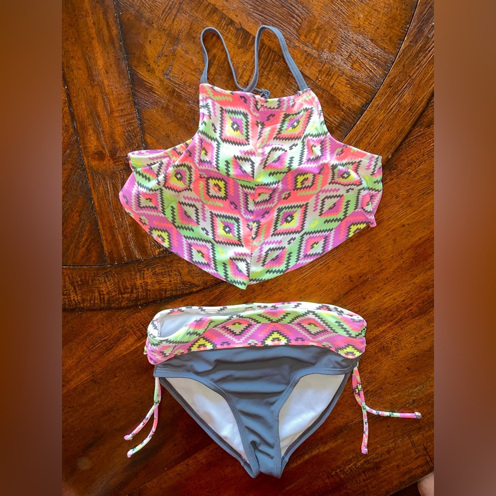 Justice size 10 two piece swim Good used condition - elastic starting to harden
